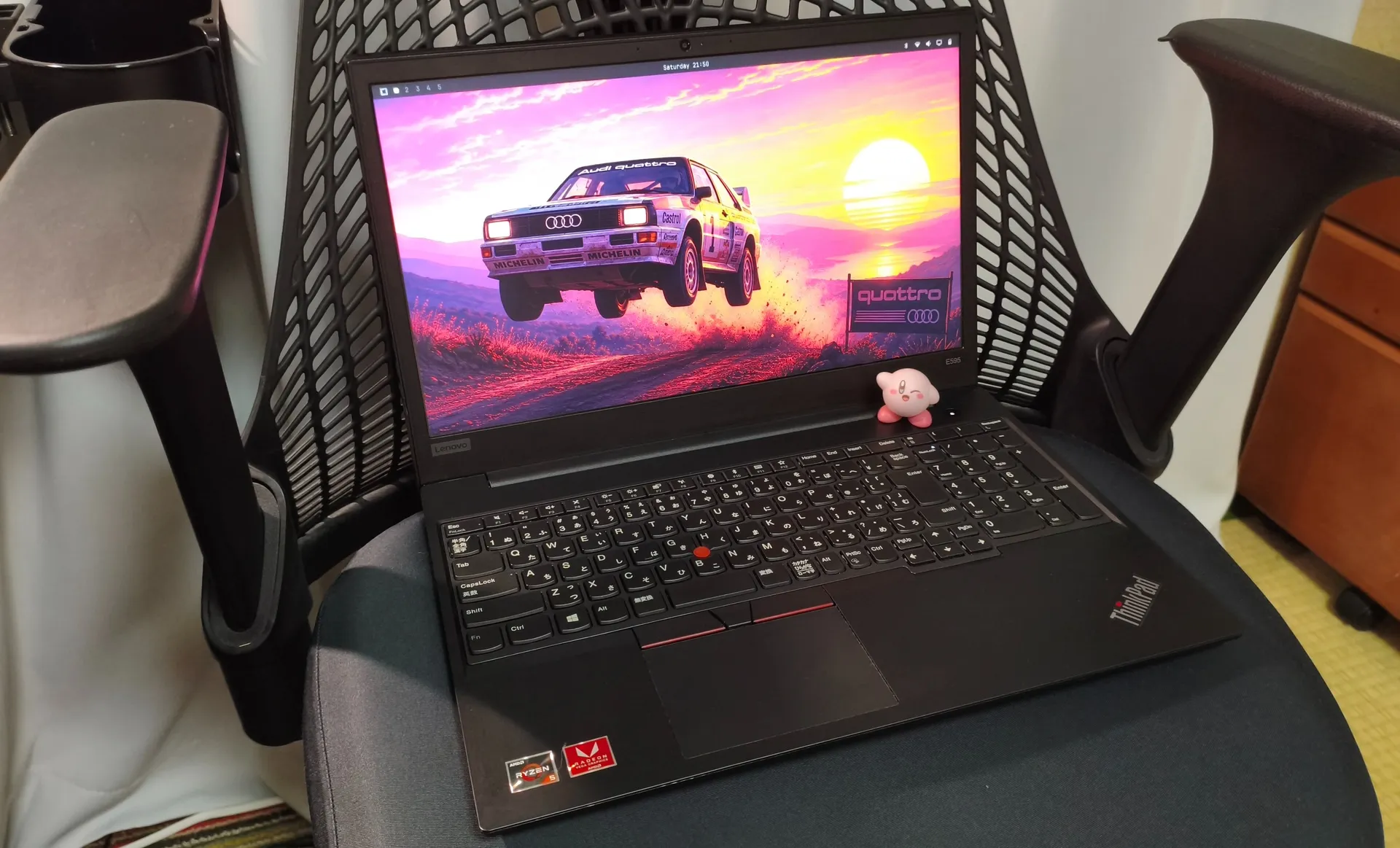 A ThinkPad E595 with a JIS keyboard, displaying the Omarchy Quattro desktop